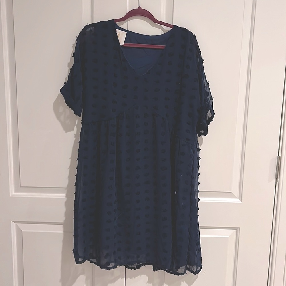 Tags on navy blue dress. Size XL